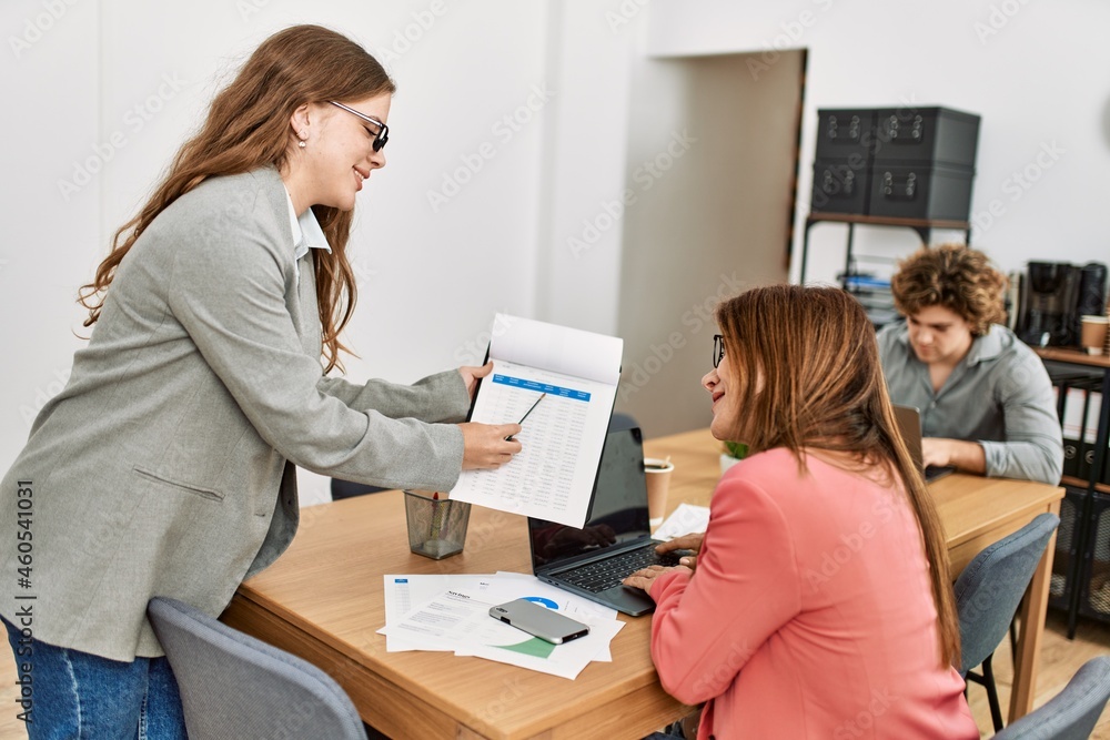 Group of business workers working at the office. Group of business workers working at the office.