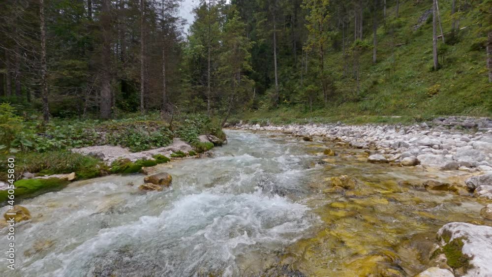 Scenic view of river flowing down from mountain Scenic view of river flowing down from mountain