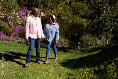 Happy african american senior couple holding hands outdoors © WavebreakMediaMicro