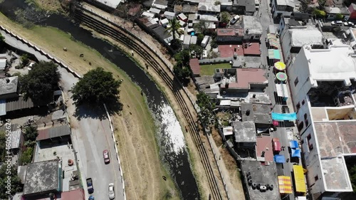 Aerial View of Urban River and Neighborhood

