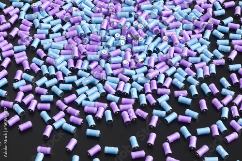 Large group of batteries on a black background. 3d render illustration.