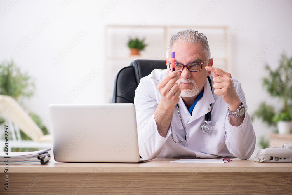 Old male doctor chemist in coronavirus concept Old male doctor chemist in coronavirus concept