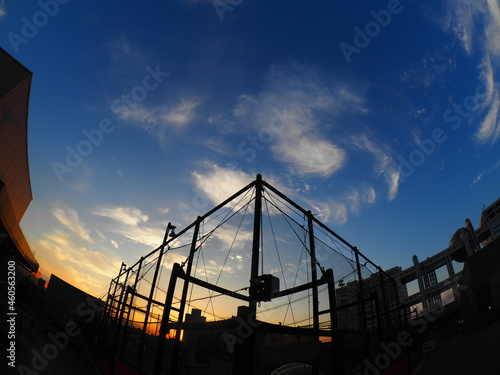 Wide-angle view of the setting sun on the Futsal (Indoor 5-man football) court in Odaiba, Japan