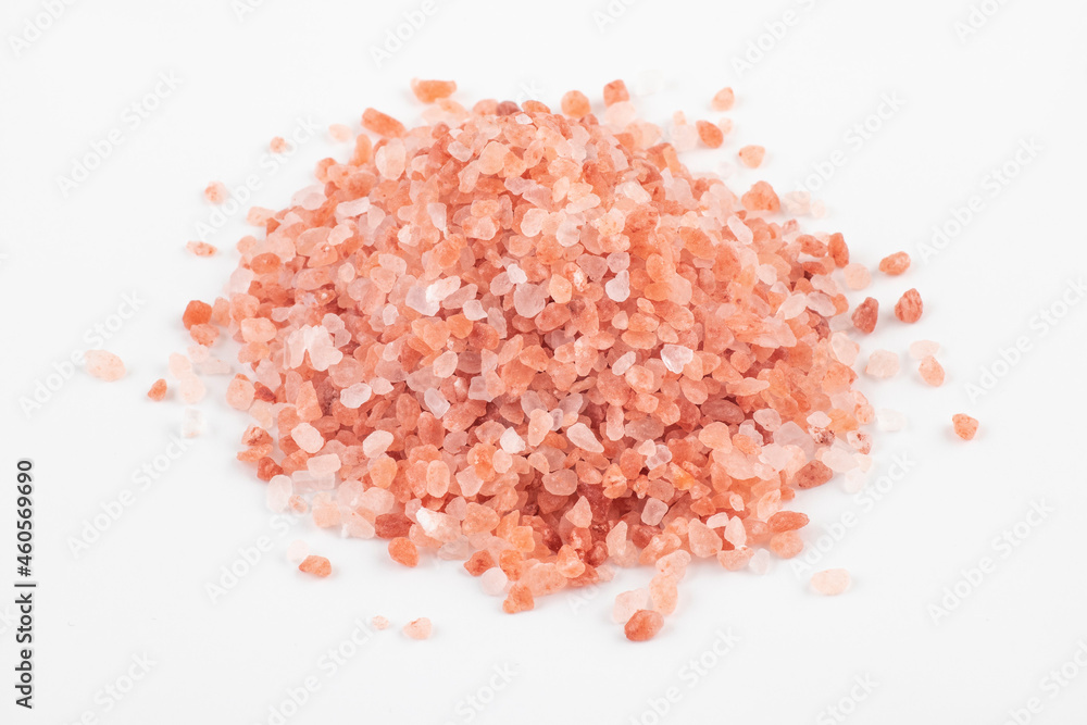 Himalayan pink salt on white background. Himalayan pink salt on white background.