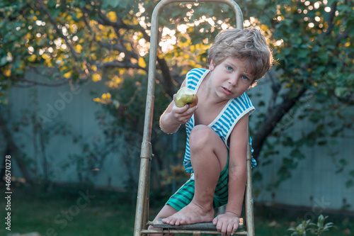 Little boy in garden © Galyna Andrushko