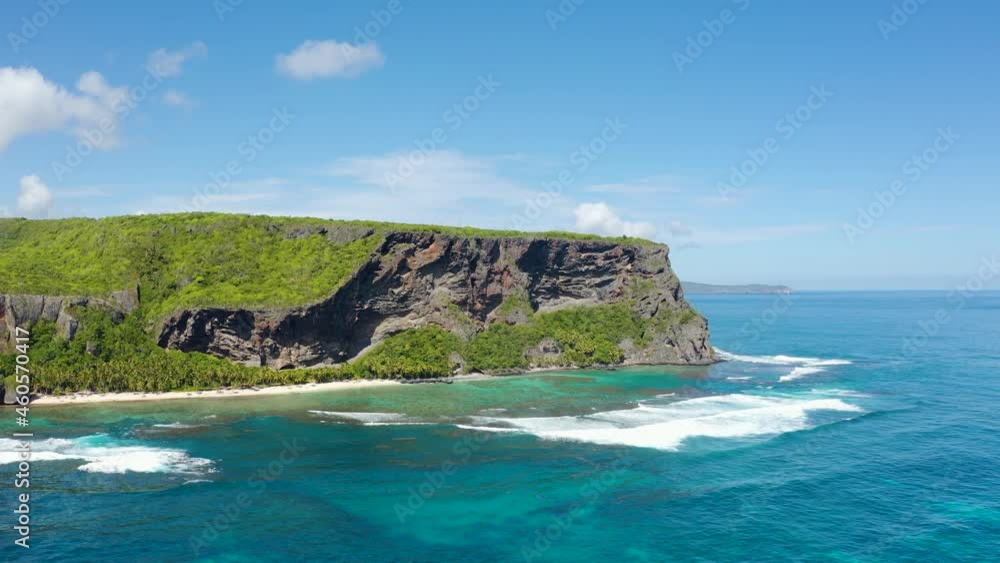 Rocky coast of Samana Peninsula Dominican Republic 4k stock video footage. Large volcanic islands in the blue Caribbean Sea landscape. Travel to a paradise tropical island. Rocky coast of Samana Peninsula Dominican Republic 4k stock video footage. Large volcanic islands in the blue Caribbean Sea landscape. Travel to a paradise tropical island.
