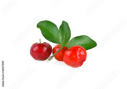 Acerola small cherry fruit with leaf isolated on white background.