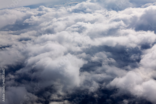 Fototapeta Naklejka Na Ścianę i Meble -  Flying above cumulus clouds . Dramatic cloudscape 