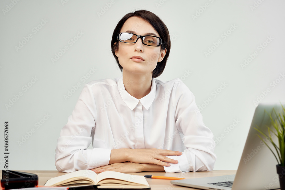 woman in costume in front of laptop documents Professional Job isolated background woman in costume in front of laptop documents Professional Job isolated background