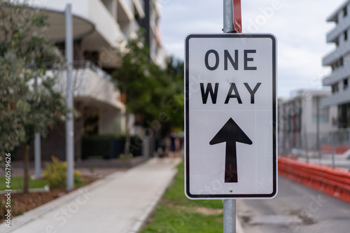 sign on the street saying one way
