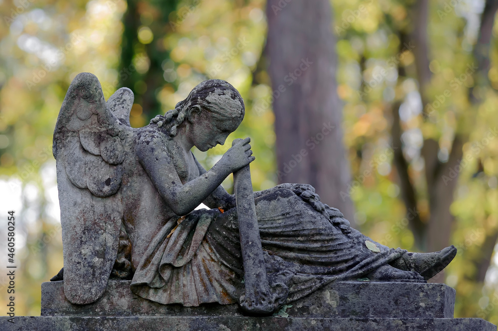 19 century tombstone with angel in Lychakiv cemetery in Lviv Ukraine 19 century tombstone with angel in Lychakiv cemetery in Lviv Ukraine