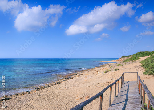 The most beautiful beaches of Italy: Campomarino dune park in Apulia, Italy. The protected area extends along the entire coast of the town of Maruggio. 