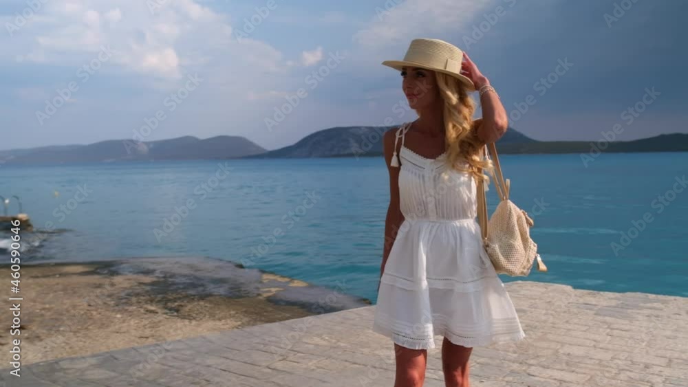 Beautiful girl tourist walking in the Ermioni, Greece Beautiful girl tourist walking in the Ermioni, Greece