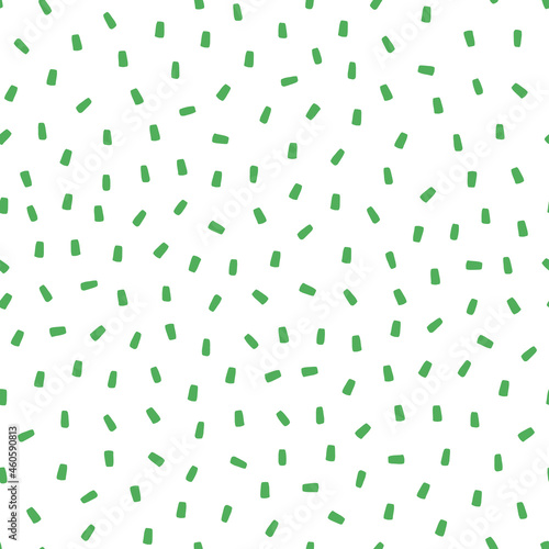 White seamless pattern with green sprinkles background.