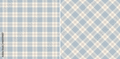 Plaid pattern tweed in pale blue and beige for dress, jacket, coat, skirt, scarf. Seamless modern herringbone textured dark small tartan check for spring autumn winter fashion fabric print. photo