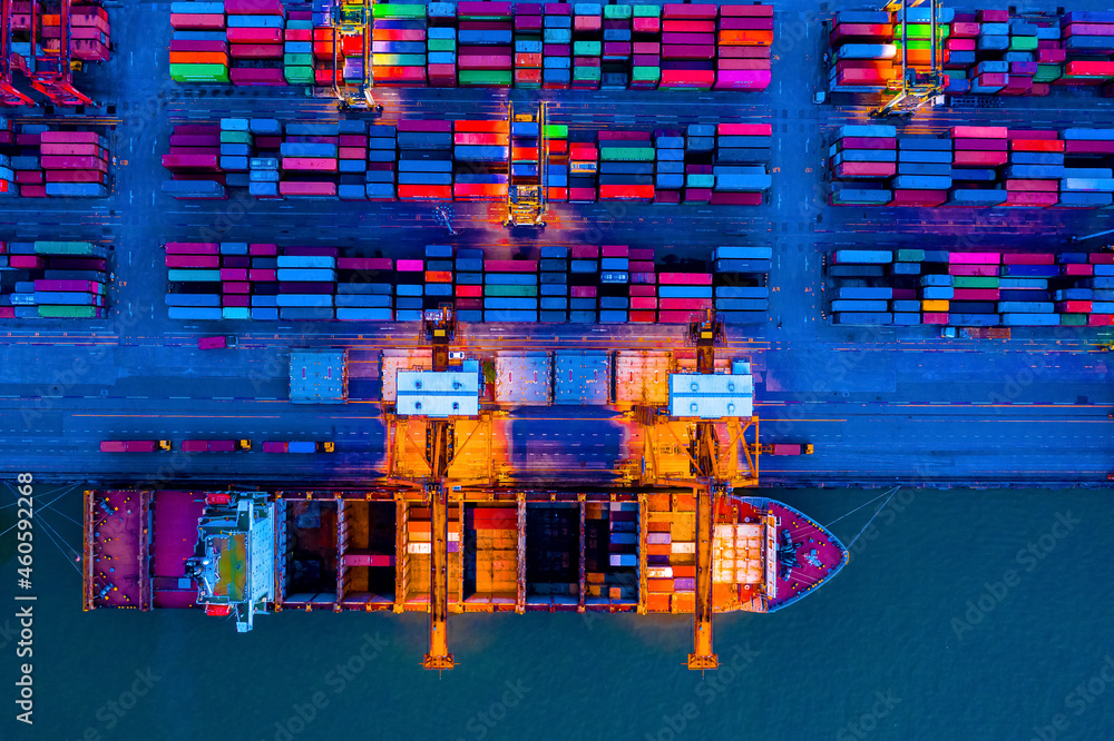 Foto de Aerial top view over international cargo ship at industrial