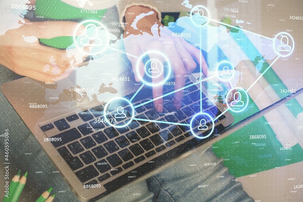 Double exposure of woman hands typing on computer and social network theme hologram drawing. People media concept. Double exposure of woman hands typing on computer and social network theme hologram drawing. People media concept.