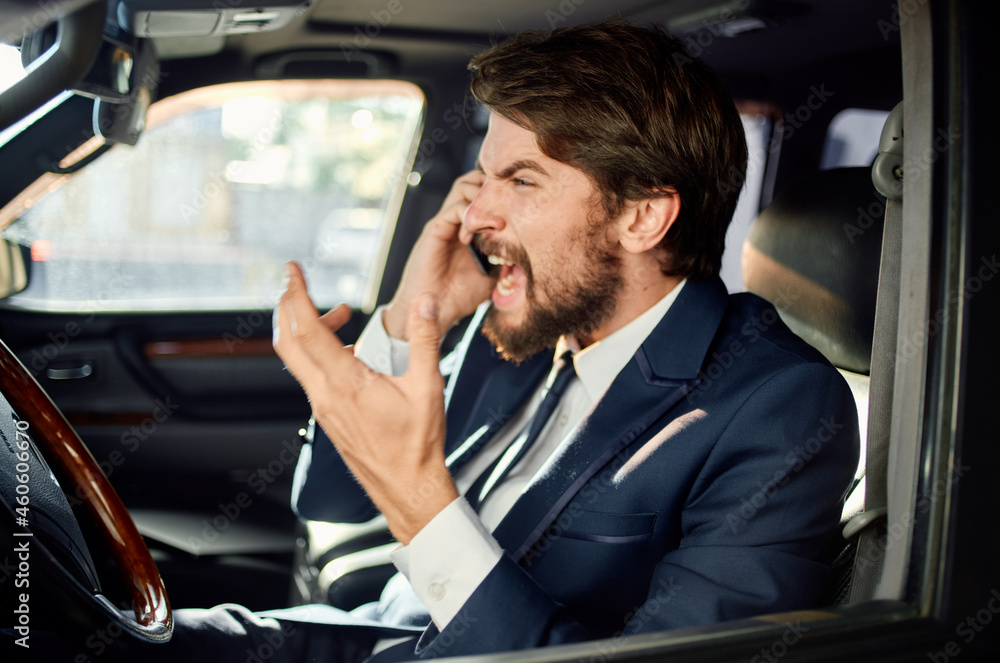 emotional man Driving a car trip luxury lifestyle success service rich