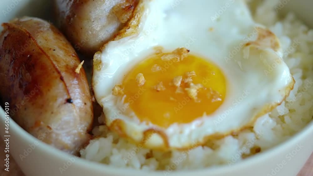 longgasilog, Filipino style hotdog with egg on top of garlic rice is one of favorite dishes of Filipinos longgasilog, Filipino style hotdog with egg on top of garlic rice is one of favorite dishes of Filipinos