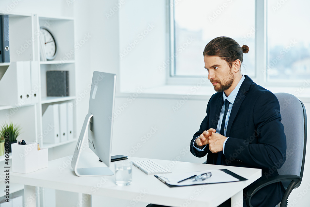 businessman work in front of a computer documents executive