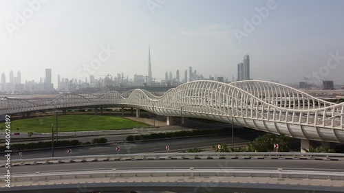 maydan bridge in the middle of dubai uae photo