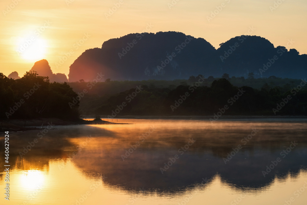 Nong Thale lake at sunrise with fog
