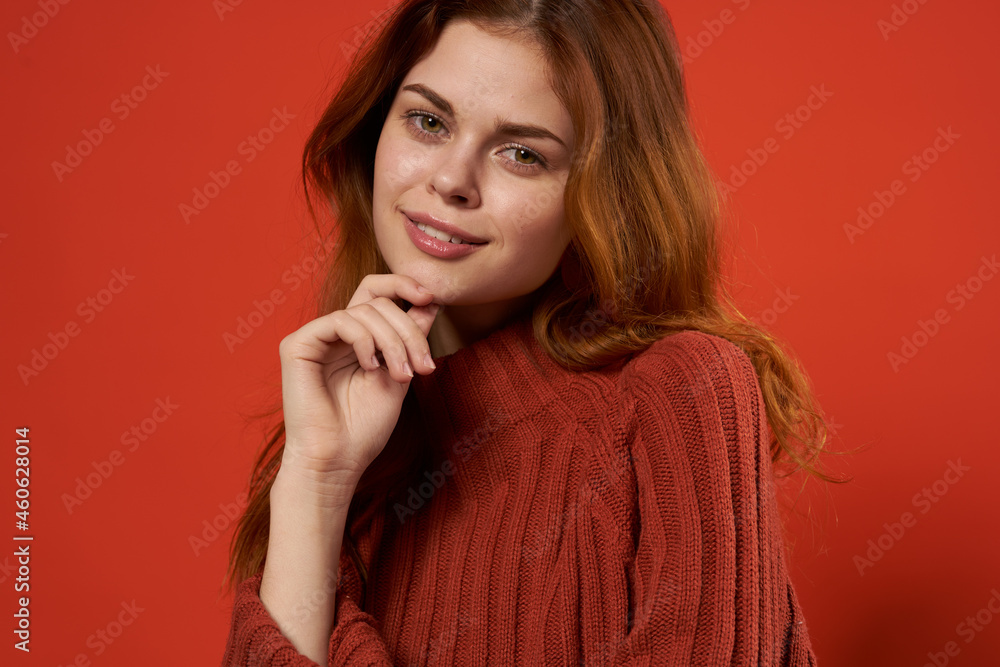 attractive red-haired woman red sweater earrings jewelry fashion attractive red-haired woman red sweater earrings jewelry fashion