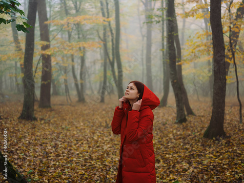 woman in red jacket autumn forest fresh air nature