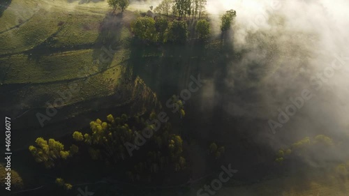 Foggy autumn landscape in the mountains, Transylvania - Romania photo