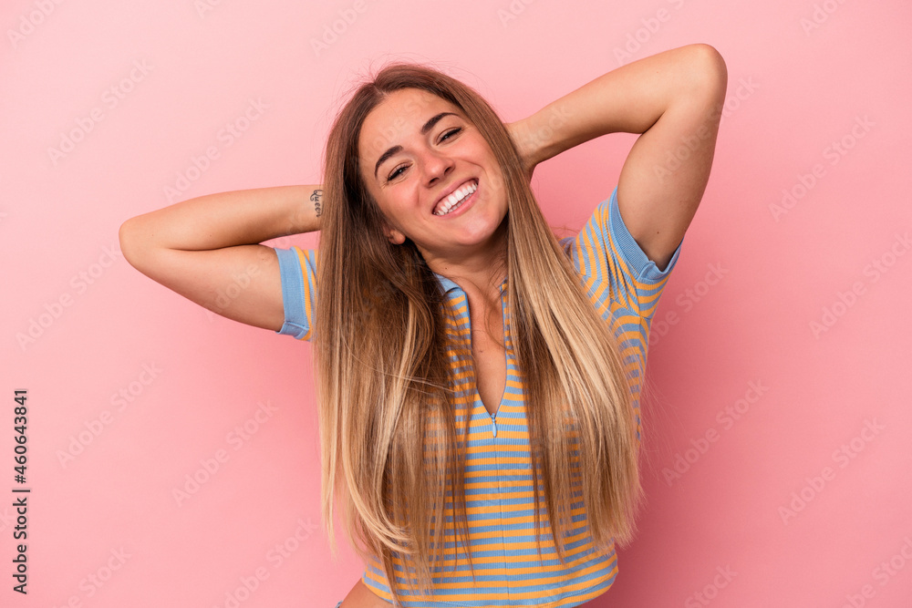 Young Russian woman isolated on pink background upset screaming with tense hands. Young Russian woman isolated on pink background upset screaming with tense hands.