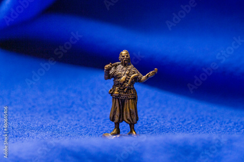 Bronze statuette of a Ukrainian Cossack with a saber from the Zaporozhian Sich photo