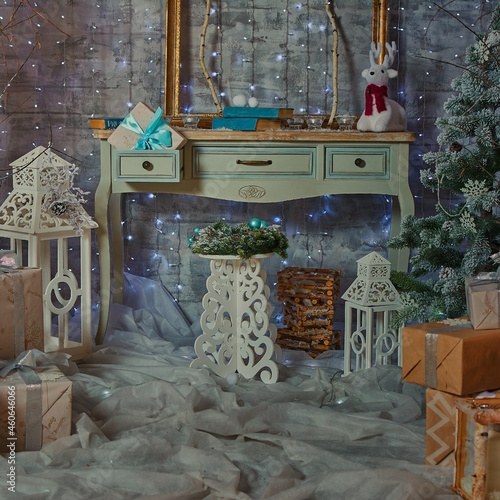 New Year's interior. Christmas decorations. Gifts under the Christmas tree.