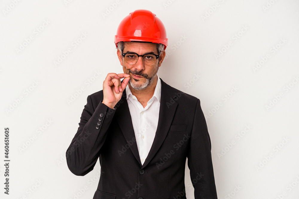 Middle age architect caucasian man isolated on white background with fingers on lips keeping a secret. Middle age architect caucasian man isolated on white background with fingers on lips keeping a secret.