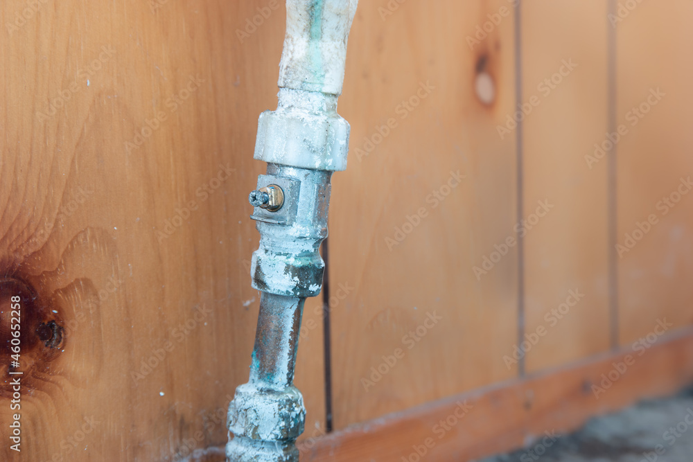 Old leaking pipe with broken isolation valve screw, compression tap