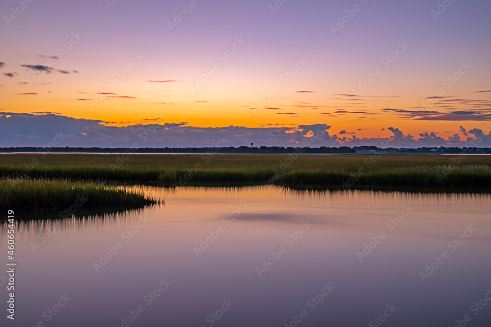 Sunrise overlooking a marsh and the Atlantic Intercoastal Waterway.