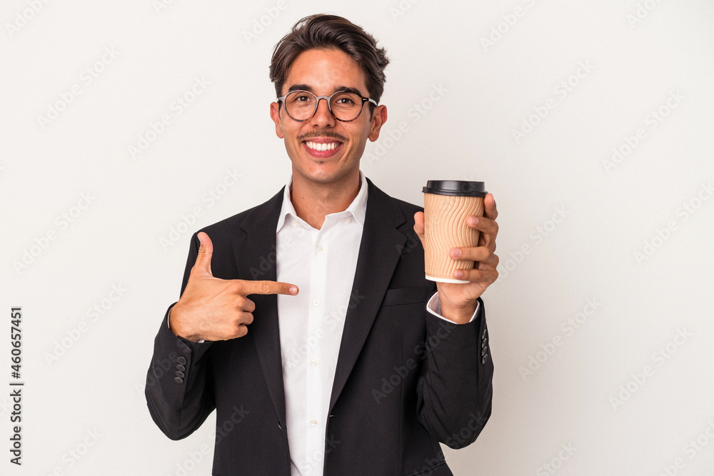 Young mixed race business man holding take away coffee isolated on white background person pointing by hand to a shirt copy space, proud and confident Young mixed race business man holding take away coffee isolated on white background person pointing by hand to a shirt copy space, proud and confident