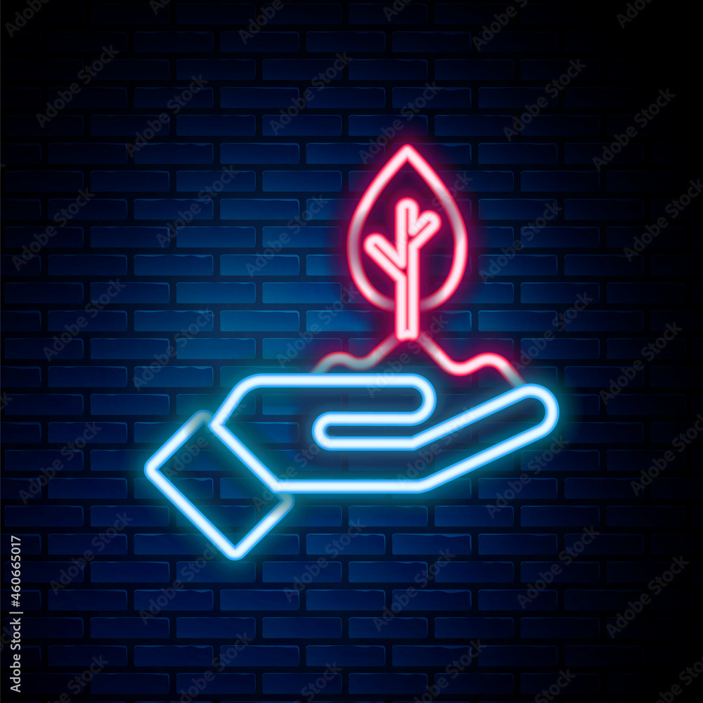 Glowing neon line Plant in hand of environmental protection icon isolated on brick wall background. Seed and seedling. Planting sapling. Colorful outline concept. Vector Glowing neon line Plant in hand of environmental protection icon isolated on brick wall background. Seed and seedling. Planting sapling. Colorful outline concept. Vector