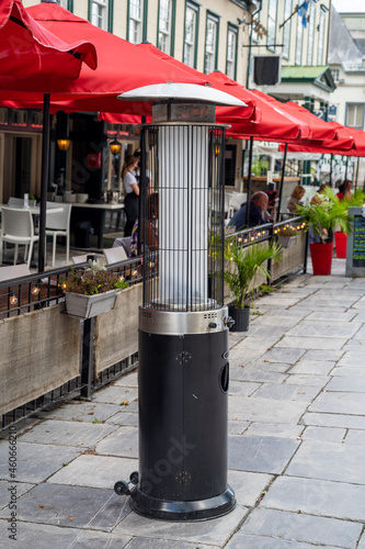 Warming gas heaters in a street cafe