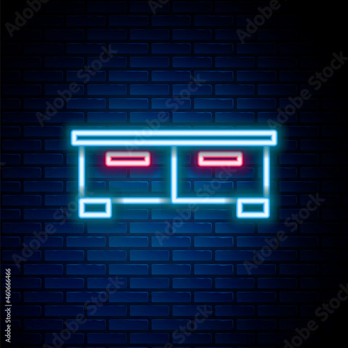 Glowing neon line Chest of drawers icon isolated on brick wall background. Colorful outline concept. Vector