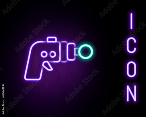 Glowing neon line Ray gun icon isolated on black background. Laser weapon. Space blaster. Colorful outline concept. Vector