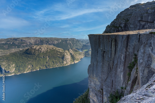 The famous and popular Preikestolen or Prekestolen (Pulpit Rock, Pulpit, Preacher's Chair), Strand, Rogaland, Norway. A steep cliff with a flat top which rises 604 metres above Lysefjorden.