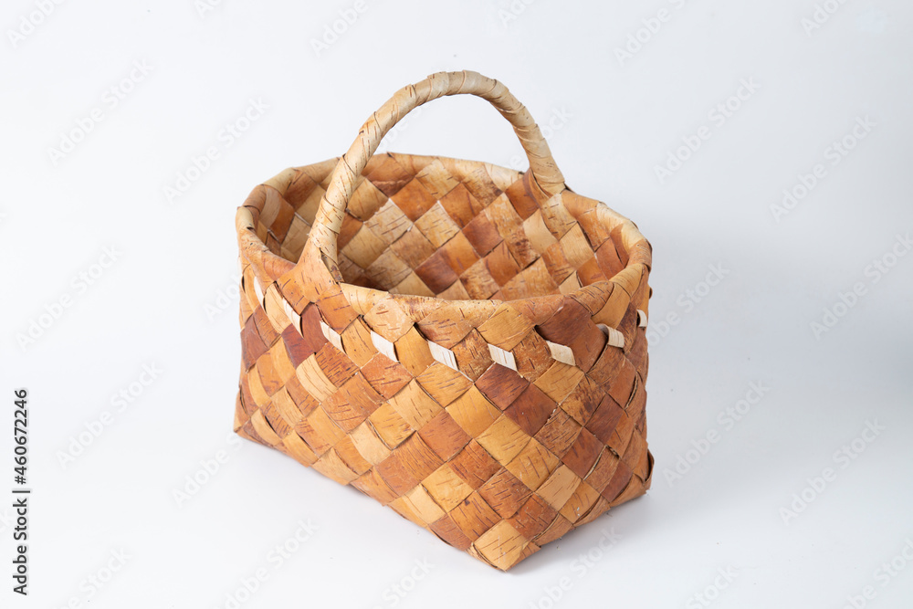 Birch bark basket on a white background.Handmade basket.