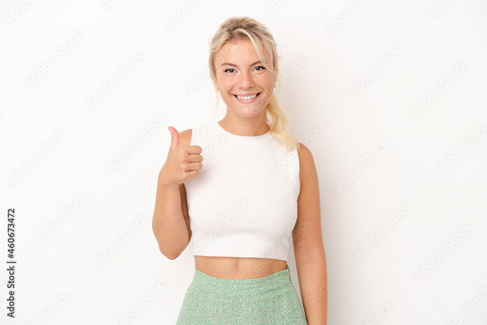 Young Russian woman isolated on white background smiling and raising thumb up Young Russian woman isolated on white background smiling and raising thumb up