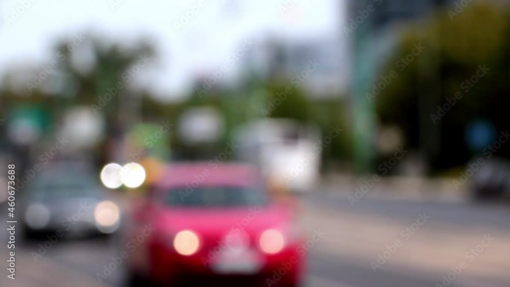 View of city traffic, out of focus, blurry background View of city traffic, out of focus, blurry background