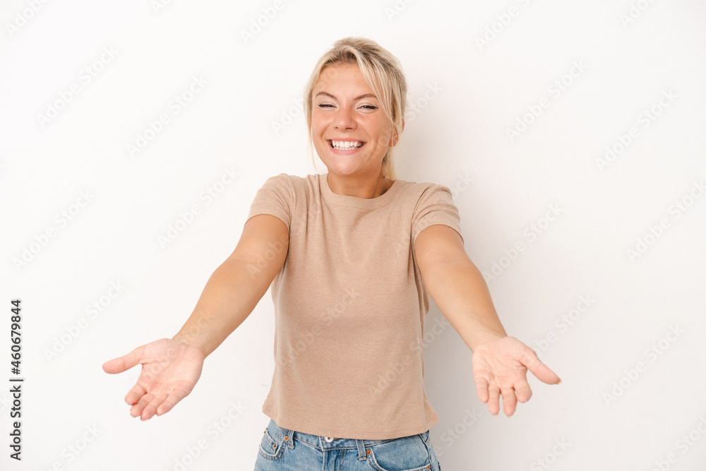 Young Russian woman isolated on white background showing a welcome expression. Young Russian woman isolated on white background showing a welcome expression.