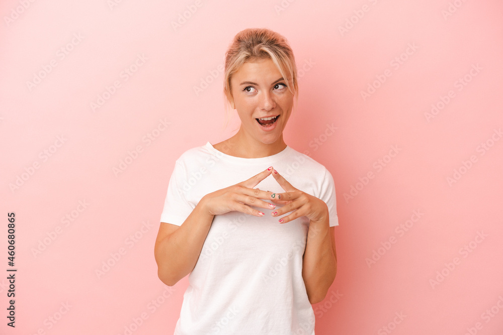 Young Russian woman isolated on pink background making up plan in mind, setting up an idea. Young Russian woman isolated on pink background making up plan in mind, setting up an idea.