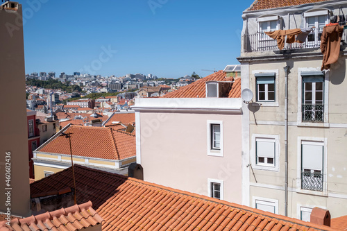 View of the city from one of the streets of the Alfama district, Lisbon, Portugal.