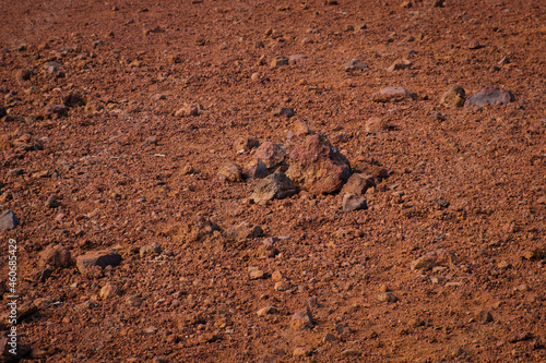 red sand and volcanic stones, Canary Island soil closeup -