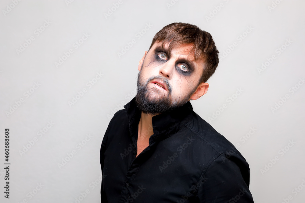 Obraz premium halloween makeup bearded man posing on camera