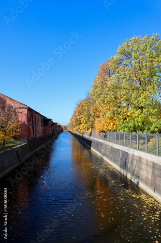 beautiful colorful autumn park on the bank of the canal in Kronstadt, Russia 